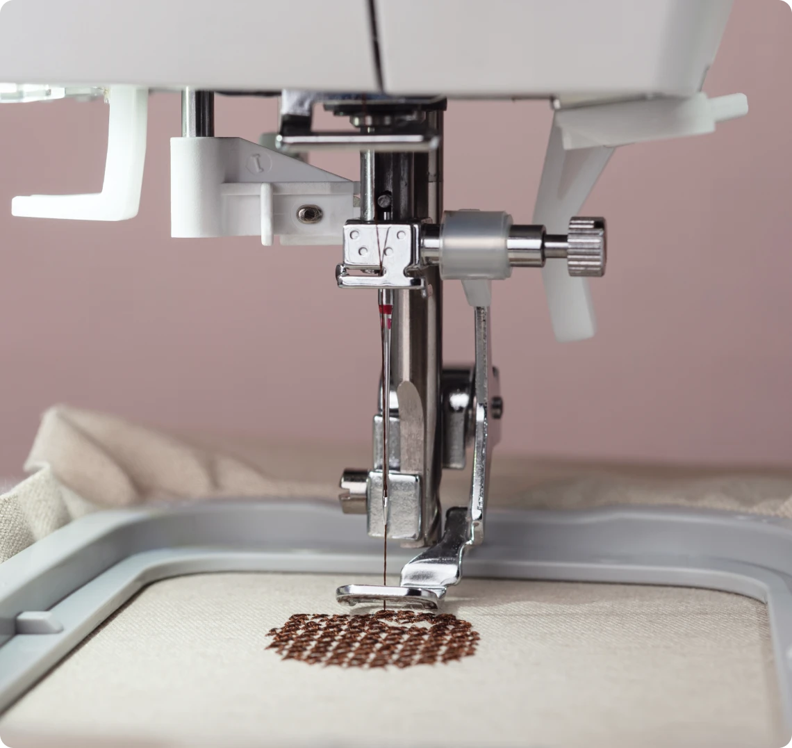 Sewing machine creating intricate design